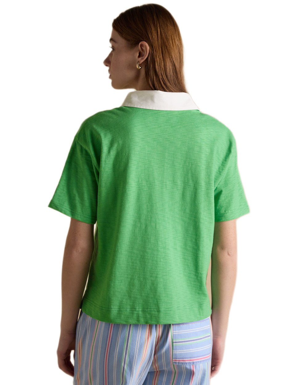 Green coloured Joules Womens Jonty Short Sleeve Cotton Rugby Shirt on white background 