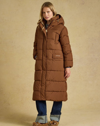 Brown Coloured Joules Womens Matchday Toffee Longline Showerproof Coat on Cream Background 