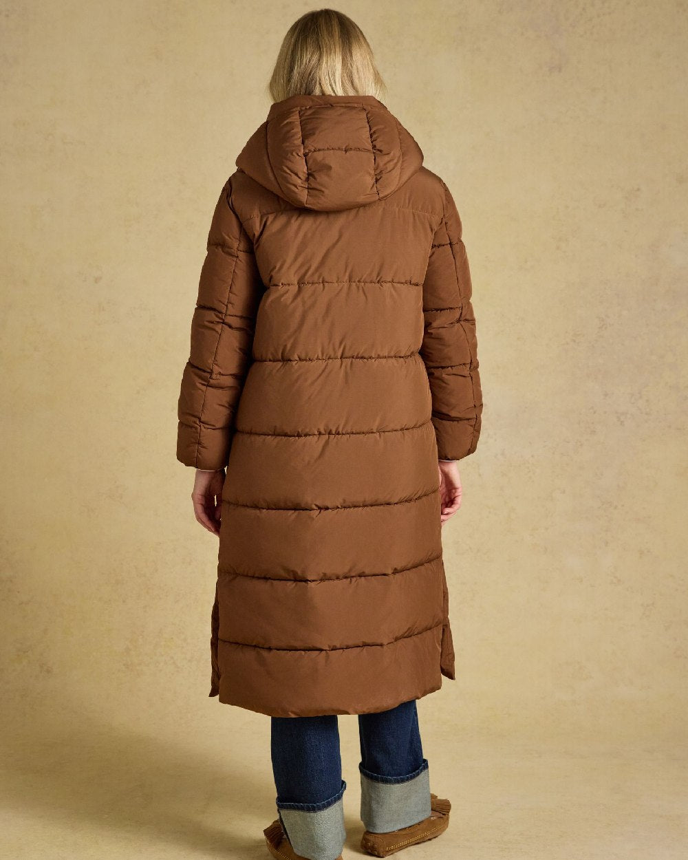 Brown Coloured Joules Womens Matchday Toffee Longline Showerproof Coat on Cream Background 