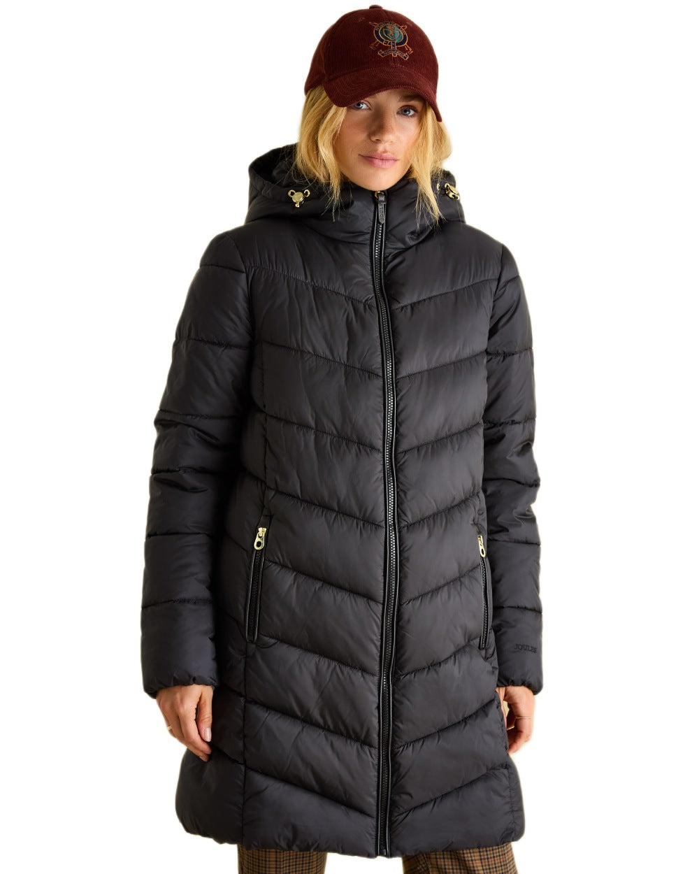 Black coloured Joules Womens Mid Length Showerproof Padded Coat With Hood on white background 