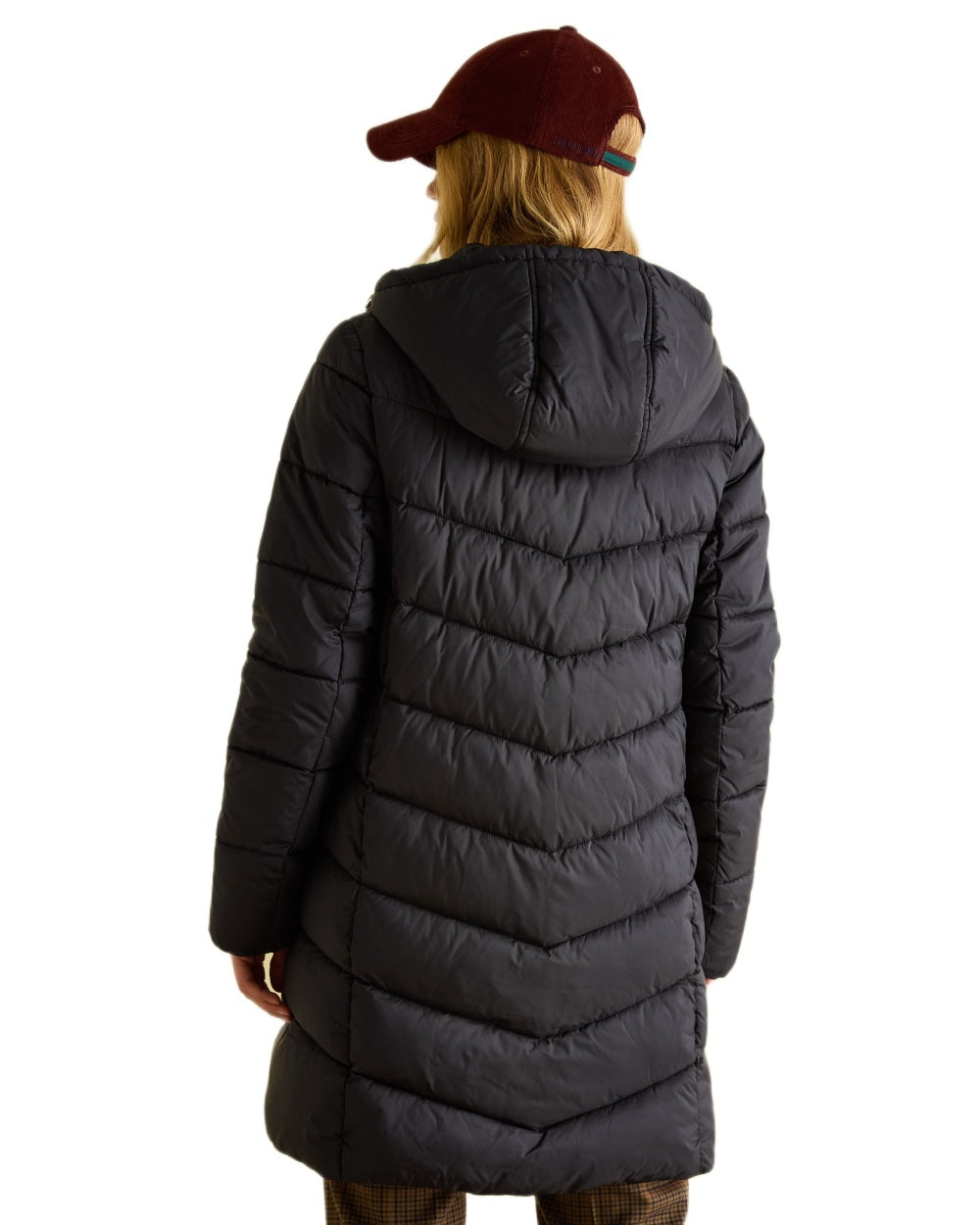 Black coloured Joules Womens Mid Length Showerproof Padded Coat With Hood on white background 