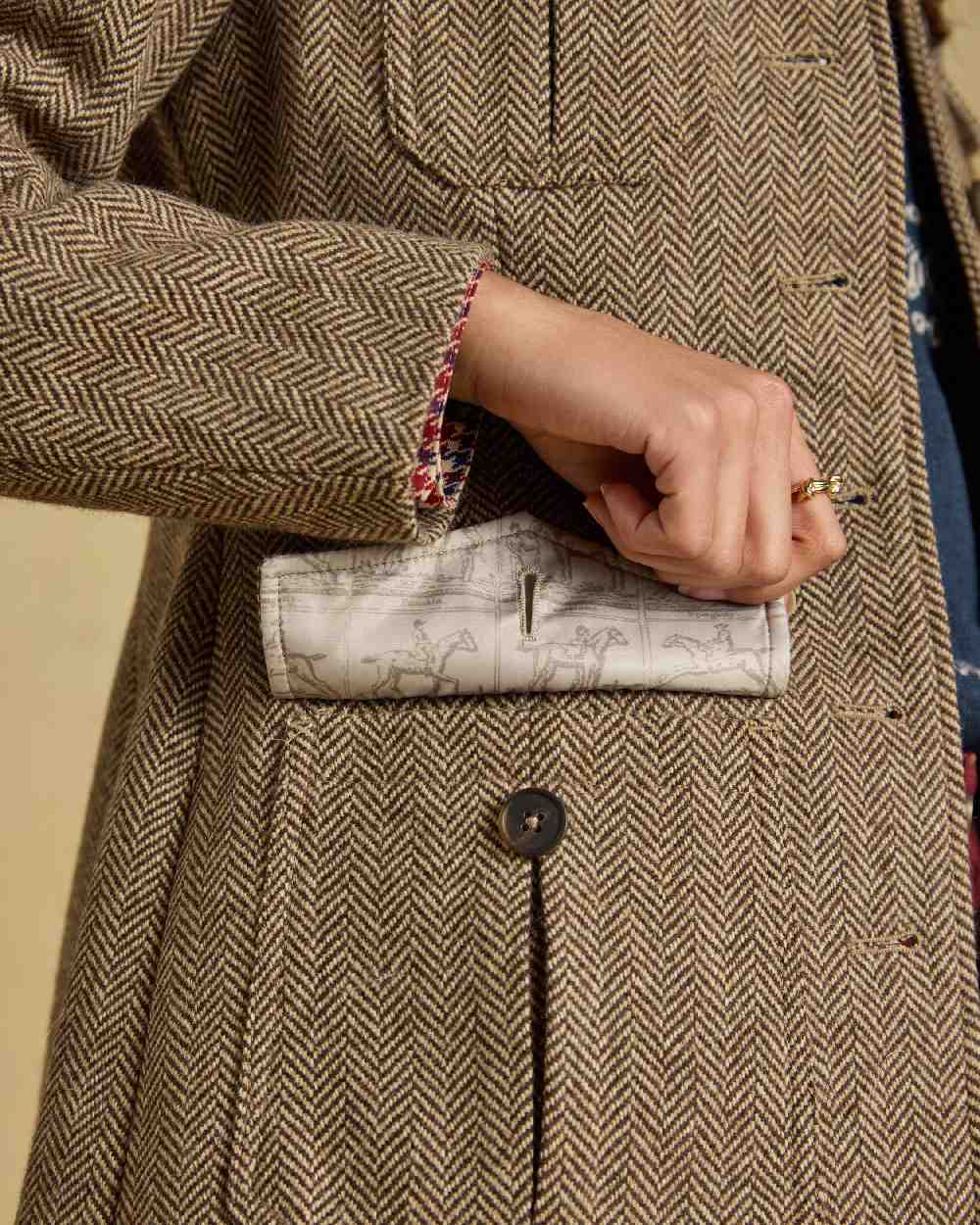 Brown Herringbone Coloured Joules Womens Saddlebury longline Jacket On Beige Background 