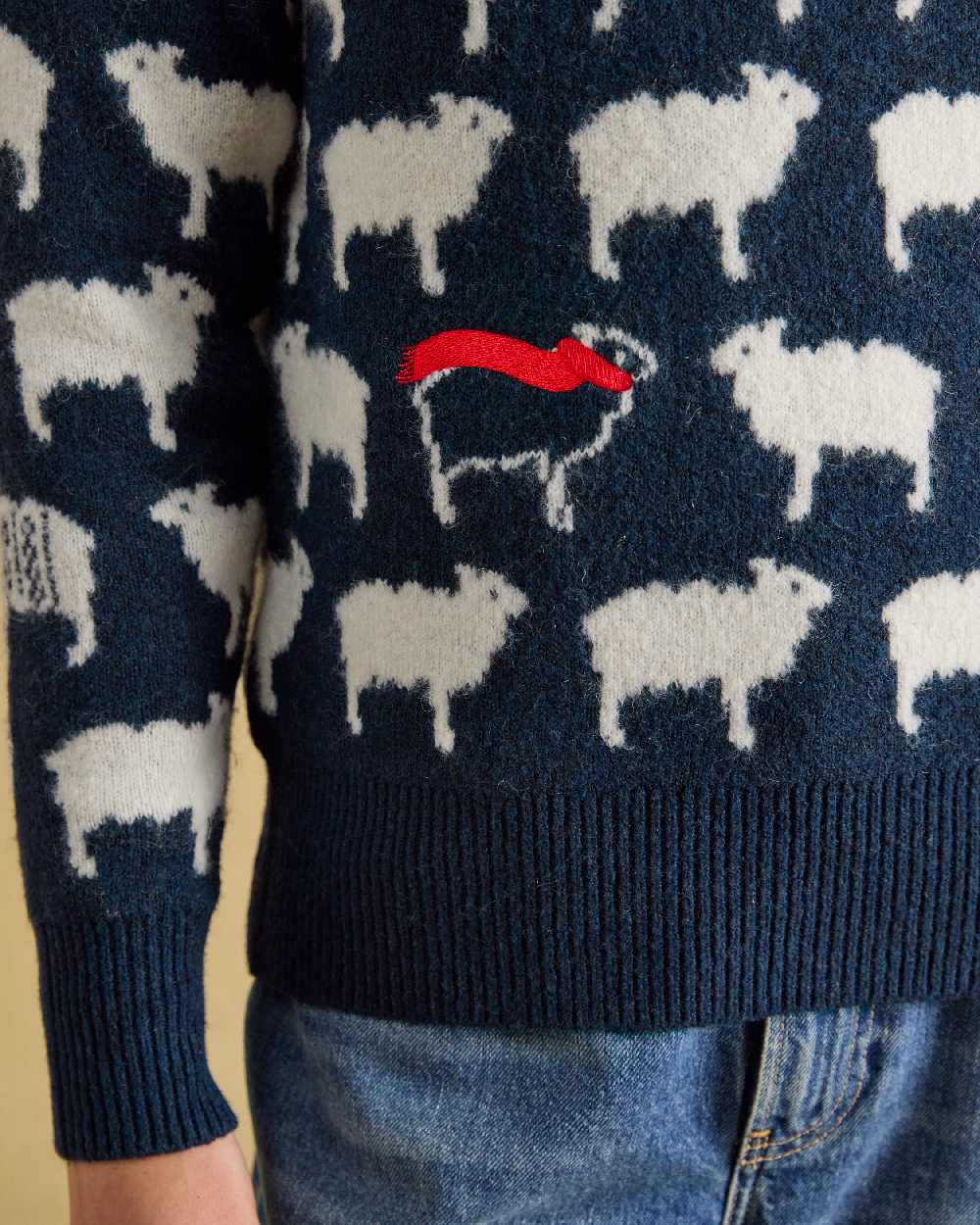 Navy Coloured Joules Womens Winter Woolies Knit on Beige Background 