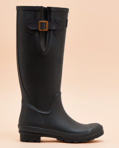 Navy Blue coloured Joules Womens Houghton Adjustable Tall Wellies on tan background 