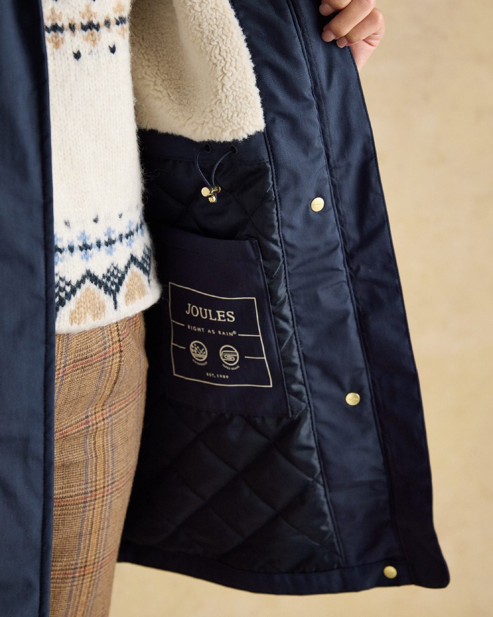 Navy Coloured Joules Portwell Waterproof Raincoat With Hood On A White Background 