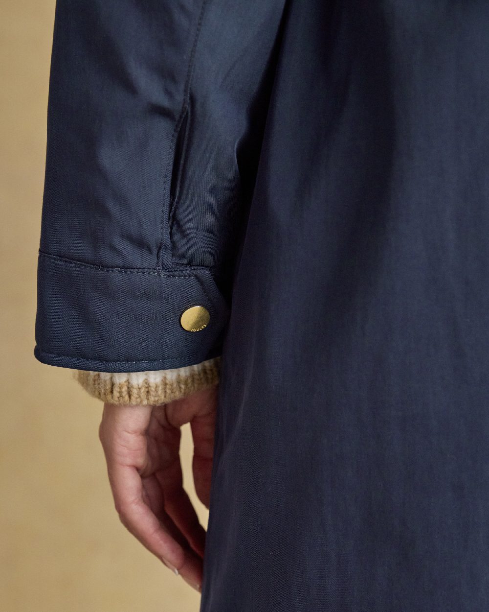 Navy Coloured Joules Portwell Waterproof Raincoat With Hood On A White Background 