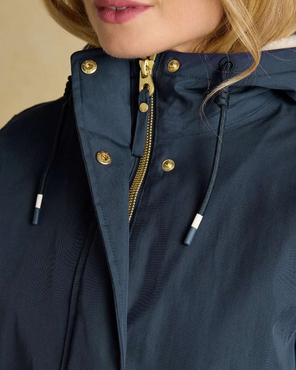 Navy Coloured Joules Portwell Waterproof Raincoat With Hood On A White Background 