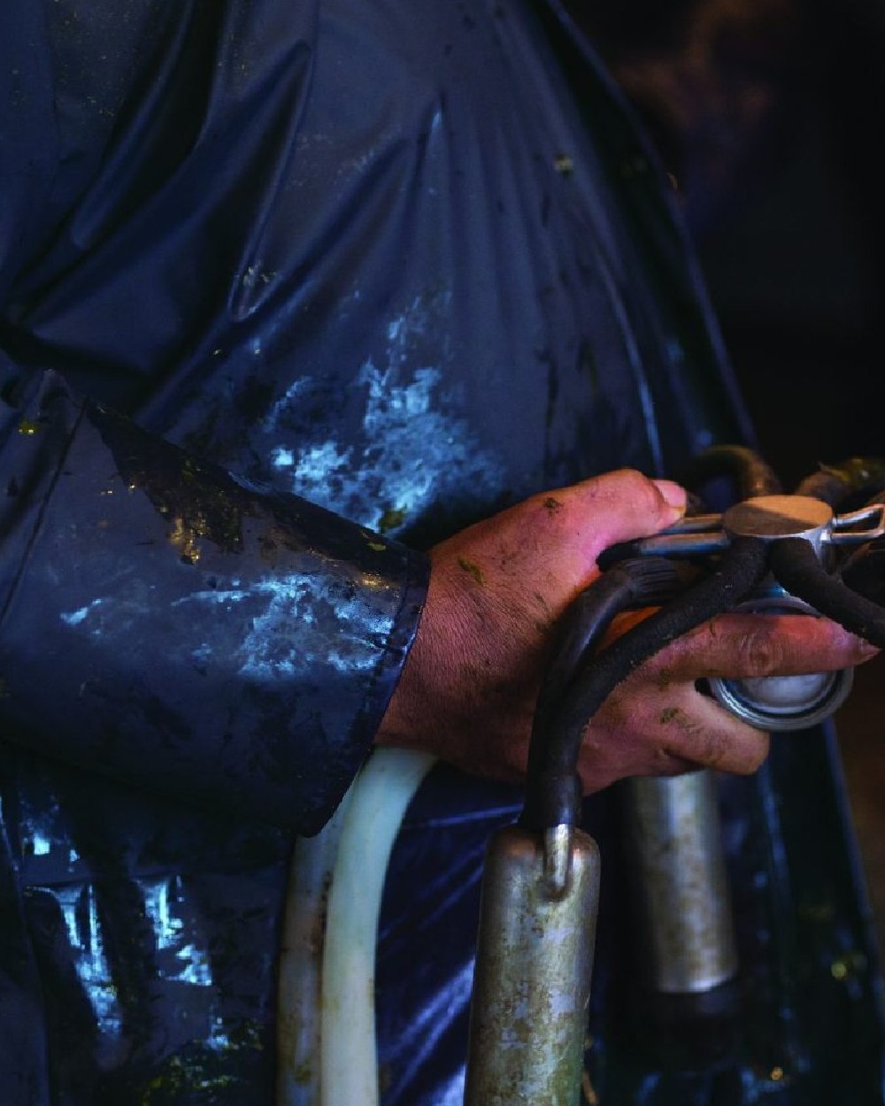 Navy coloured Kaiwaka Mens AgTex Parka on factory background 