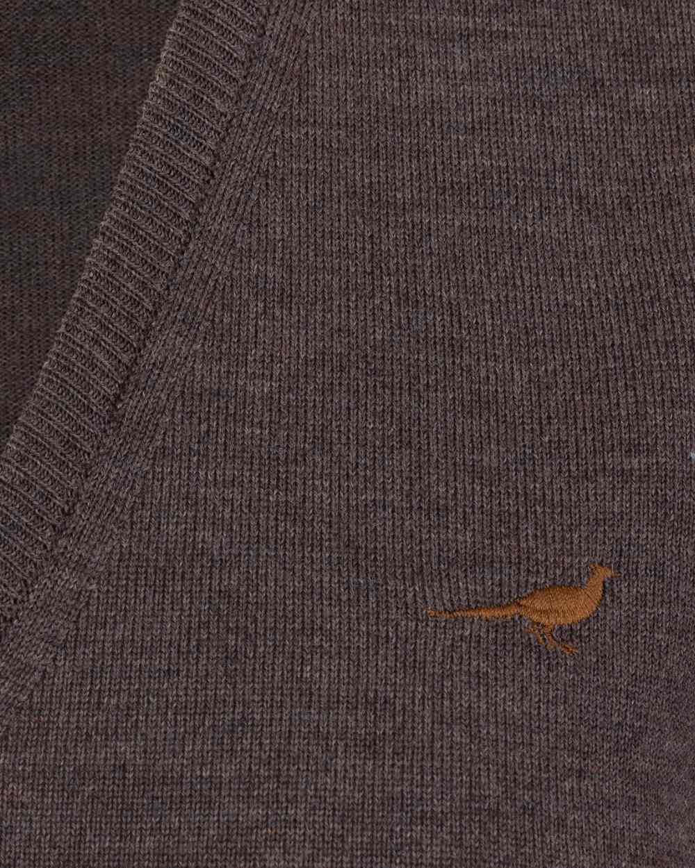 Chocolate coloured Laksen Camilla V-Neck Merino Sweater on white background 