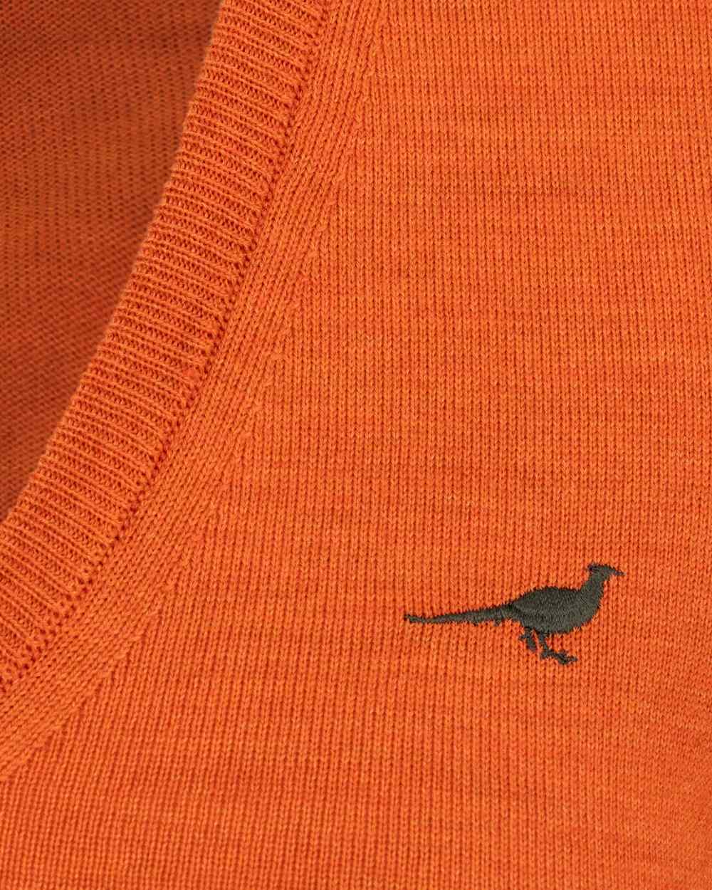 Orange coloured Laksen Camilla V-Neck Merino Sweater on white background 
