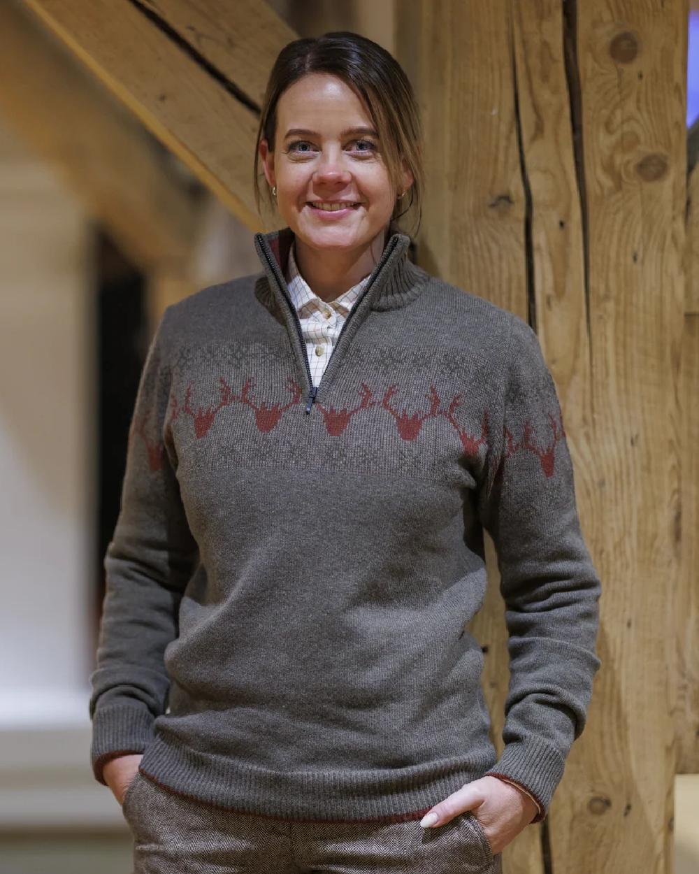 Brown Coloured Laksen Lady Deer Jacquard Lambswool Sweater on Near wooden side Background 
