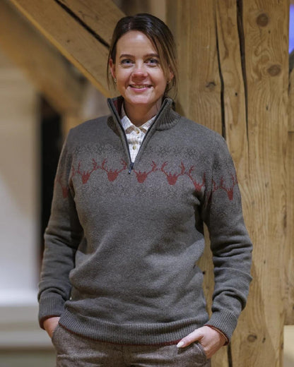Brown Coloured Laksen Lady Deer Jacquard Lambswool Sweater on Near wooden side Background 