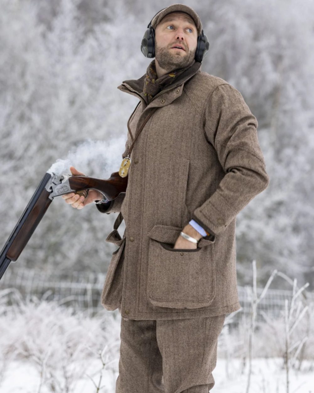 Astor Fairfax coloured Laksen Mens Astor Fairfax Tweed CTX Waterproof Coat on snow background 