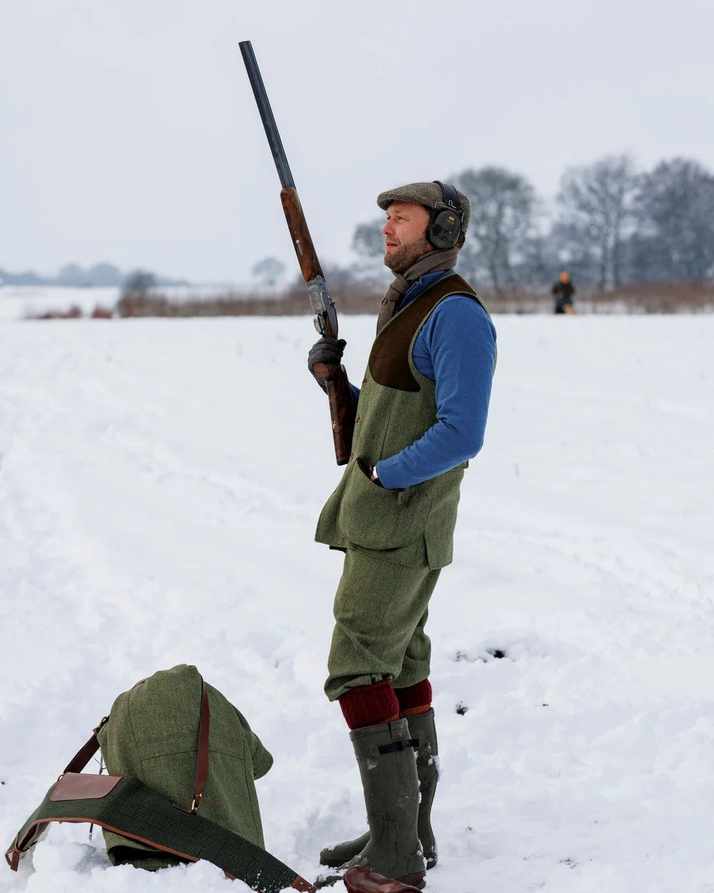 Berleigh Coloured Laksen Mens Leith Tweed Shooting Vest on Outside Snow Background 