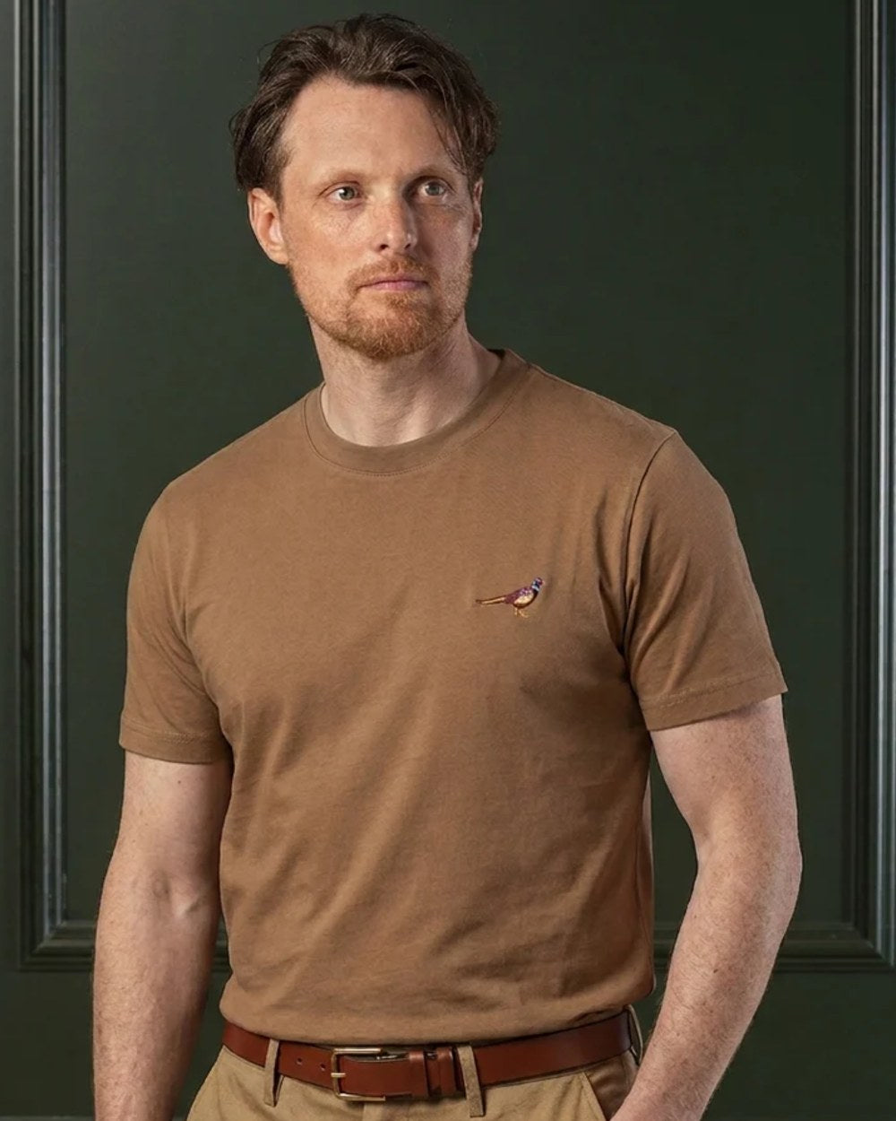 Camel coloured Laksen Mens Pheasant Cotton T-Shirt on wall background 