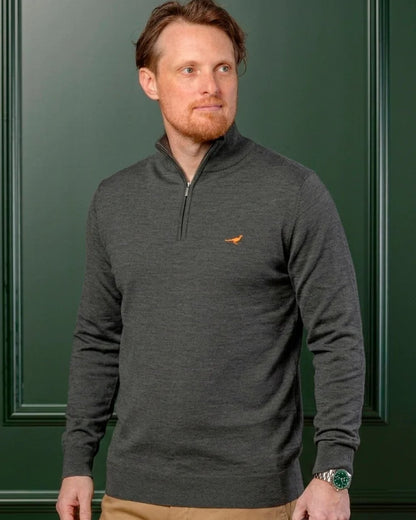 Loden Green Coloured Laksen Norfolk Zip Neck Merino Sweater on indoor background 