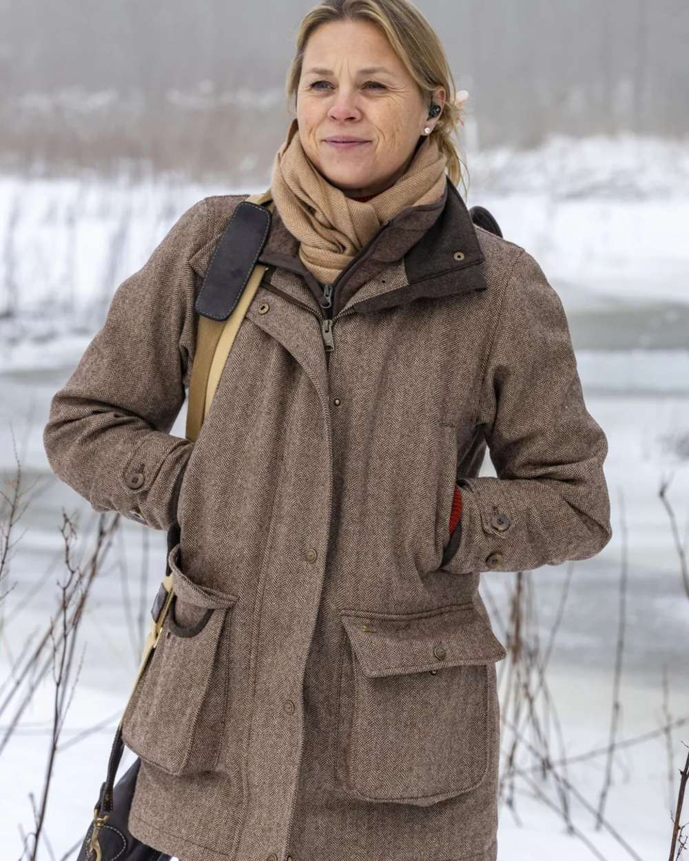 Glyn Tweed Check coloured Laksen Womens Glyn Tweed CTX Waterproof Hunting Jacket on snow background 
