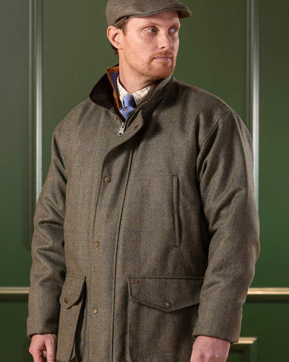 Laksen Laird Chatsworth Tweed Coat With CTX On A Wall Background