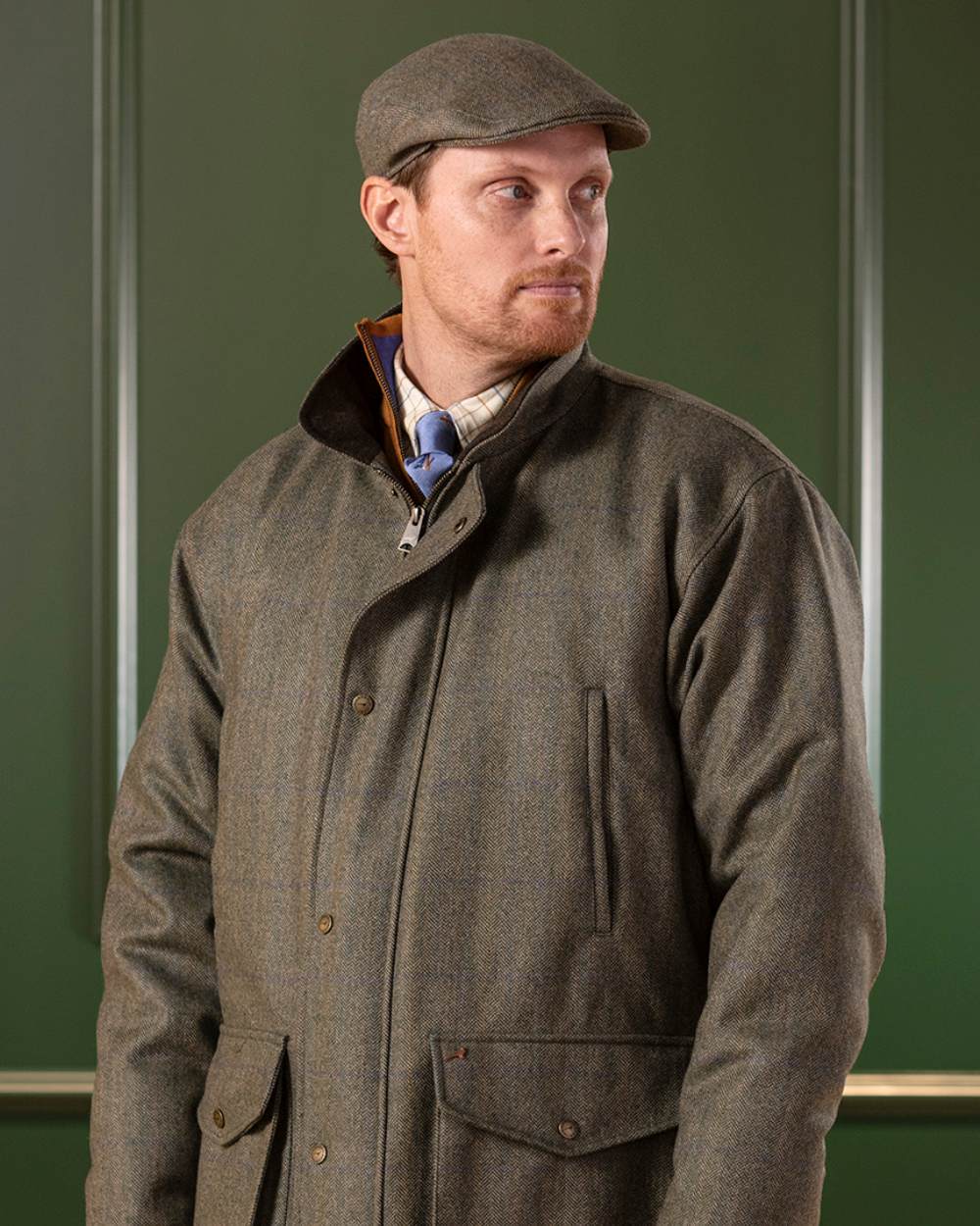 Laksen Laird Flat Cap On A Wall Background