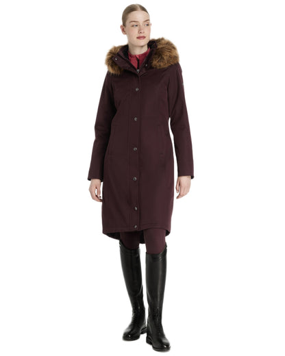 Damson Coloured LeMieux Anya Waterproof Riding Coat On A White Background 