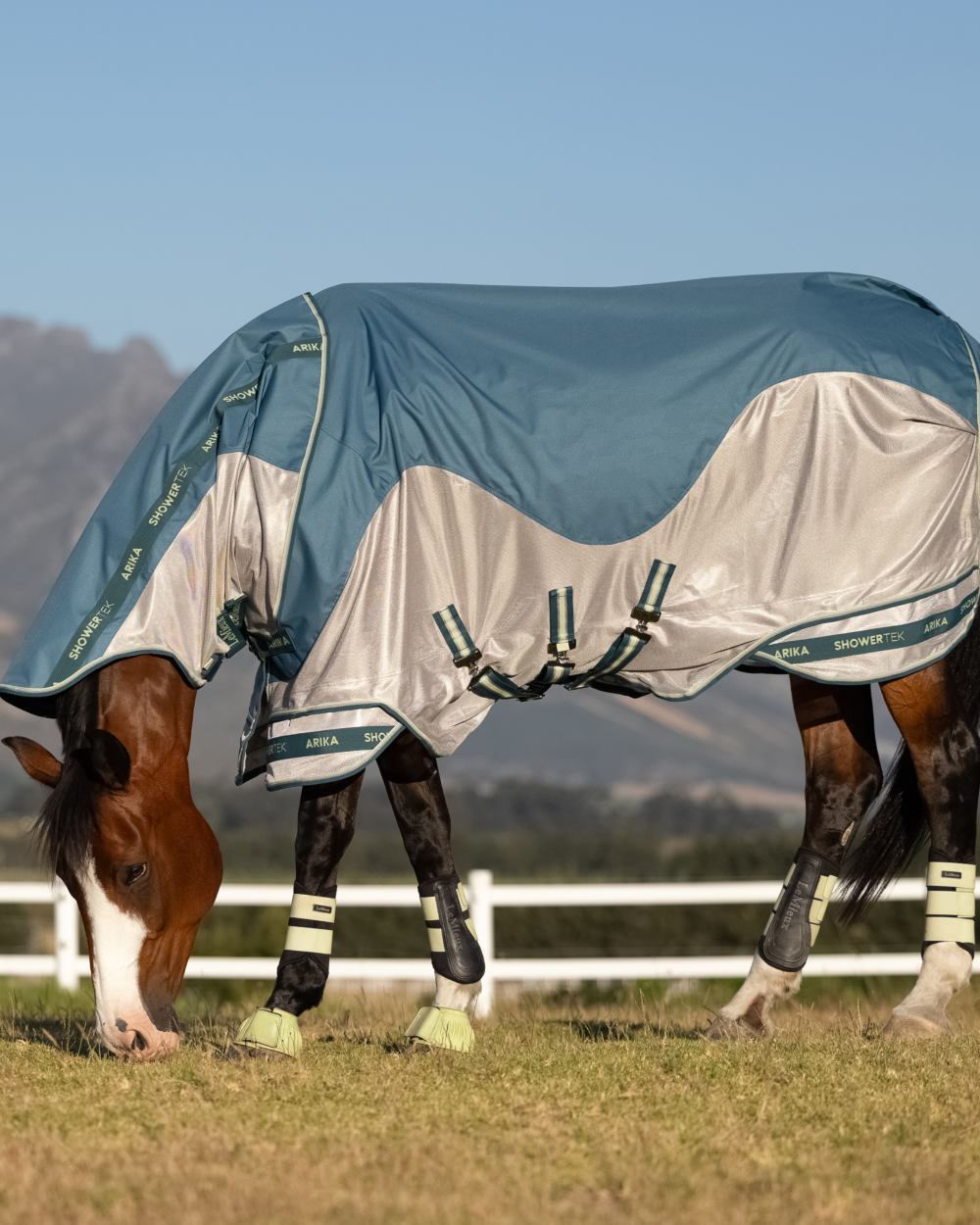 Jungle coloured LeMieux Arika Camo Shower-Tek Fly Rug on outdoor background 
