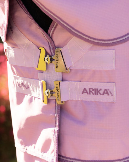 Fondant coloured LeMieux Arika Ripstop 50g Turnout Horse Rug on outdoor background 
