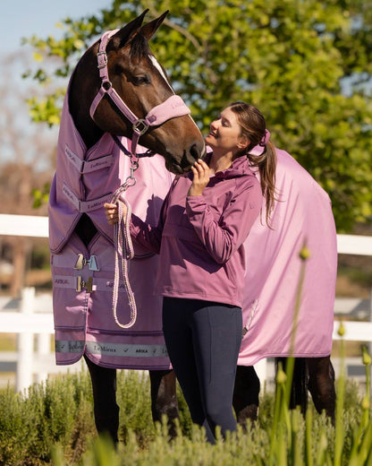 Fondant coloured LeMieux Arika Ripstop 50g Turnout Horse Rug on outdoor background 