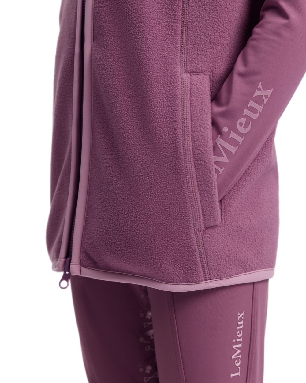 Mallow coloured LeMieux Childrens Bobbi Fleece Gilet on white background 