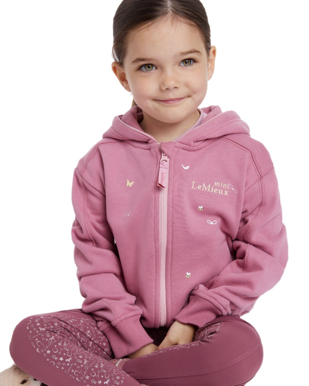 Peony coloured LeMieux Childrens Mini Charlie Zip Through Hoodie on white background 