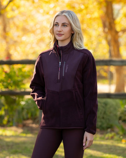 Damson coloured LeMieux Clara Hybrid Fleece on tree background 