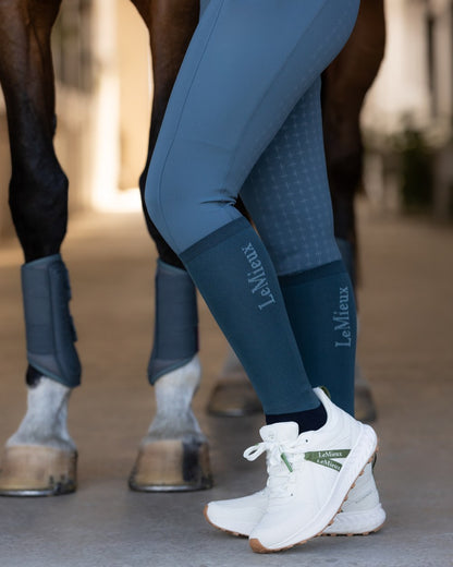 Petrol coloured LeMieux Competition Socks - Twin Pack Clearance on stable background 