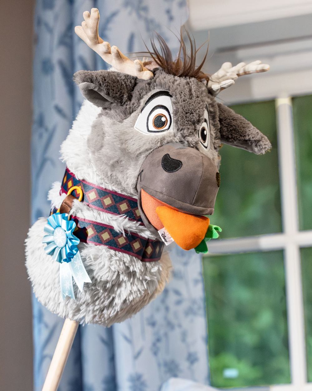 Sven coloured LeMieux Disney Hobby Horse Accessories Set on house background 