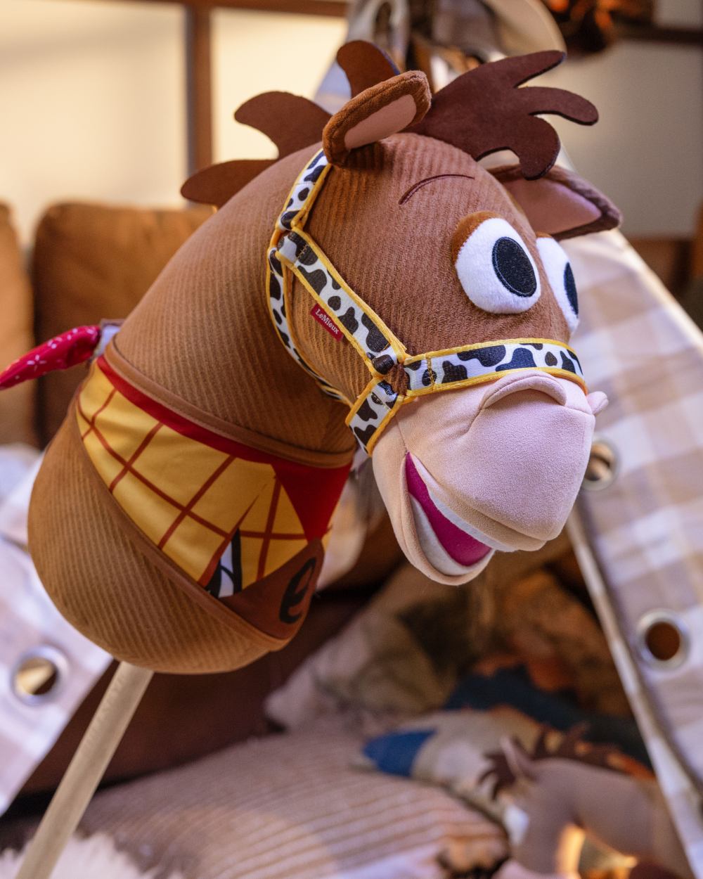 Bullseye coloured LeMieux Disney Hobby Horse Bullseye on house background 