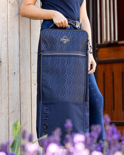Navy coloured LeMieux Elite Pro Bridle Bag on outdoor background 