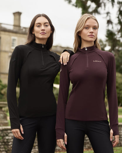 Black coloured LeMieux Frances Quarter Zip Fleece on outdoor background 