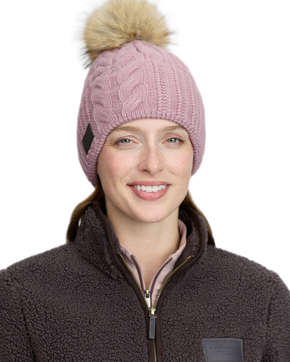 Wild Rose coloured LeMieux Heritage Beanie on white background 