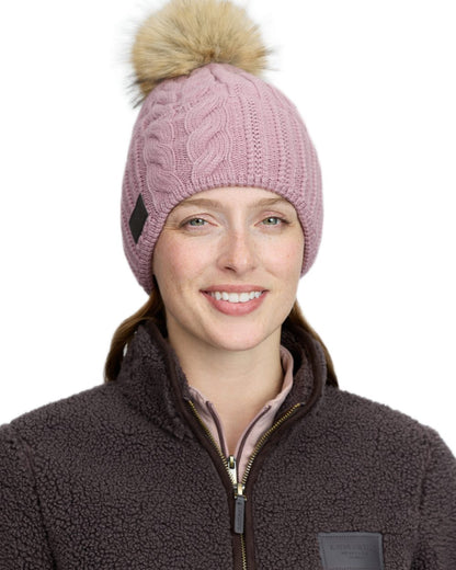 Wild Rose coloured LeMieux Heritage Beanie on white background 