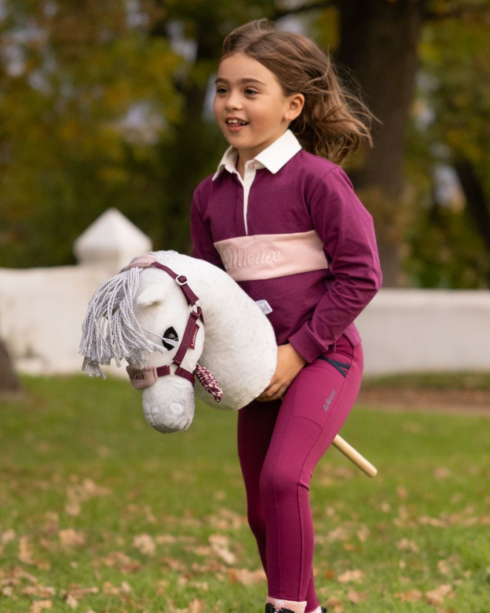 Coco coloured LeMieux Hobby Horse Coco on garden background 