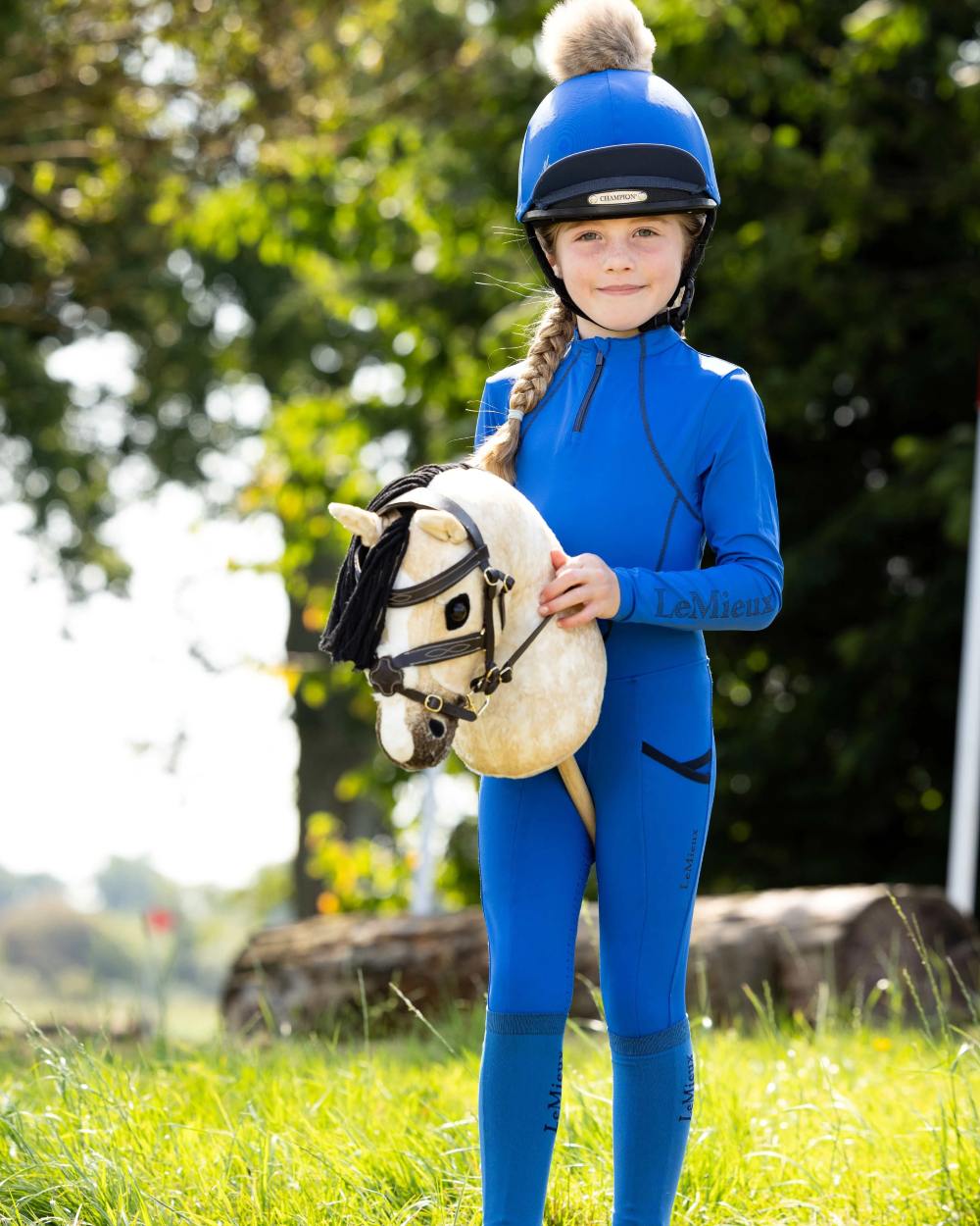 Dream coloured LeMieux Hobby Horse Dream on garden background 