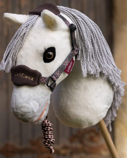 Cocoa coloured LeMieux Hobby Horse Vogue Headcollar on outdoor background 