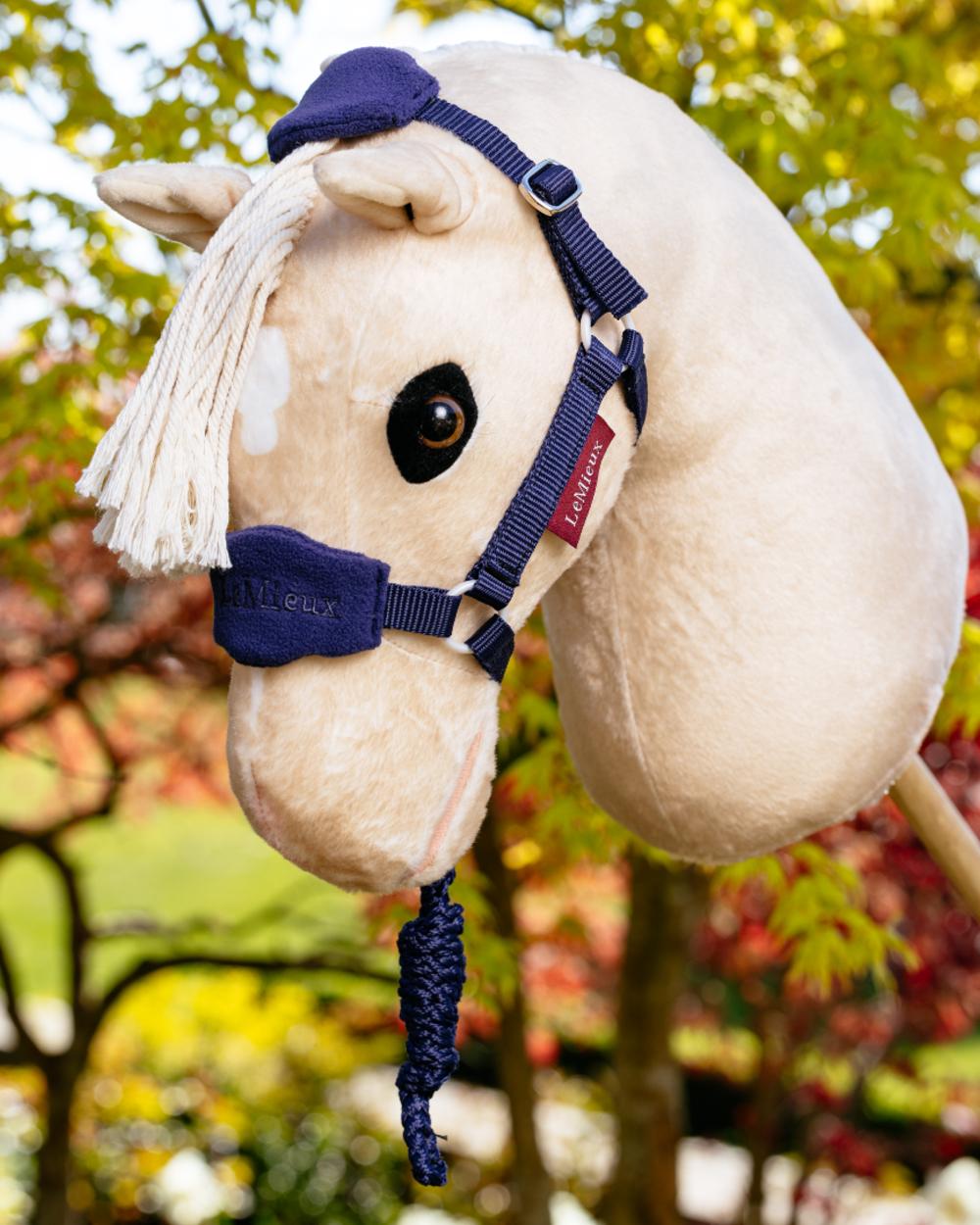 Ink Blue coloured LeMieux Hobby Horse Vogue Headcollar on outdoor background 
