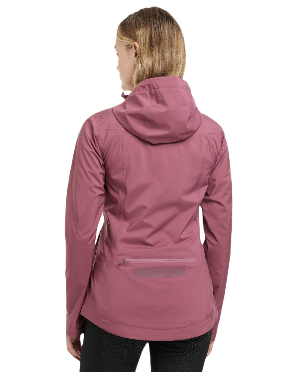 Rosewood coloured LeMieux Isla Short Waterproof Jacket on brown background 