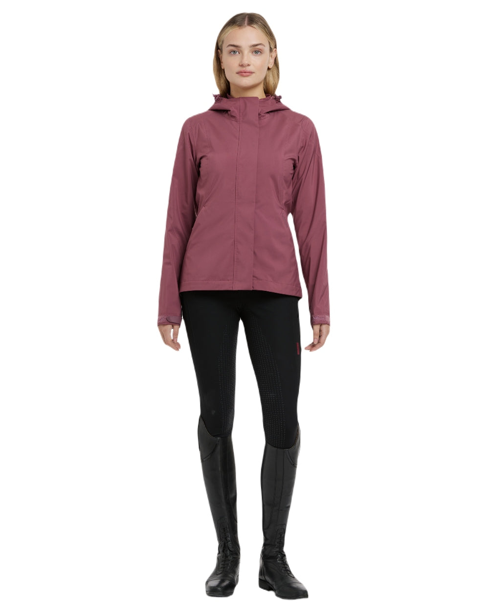 Rosewood coloured LeMieux Isla Short Waterproof Jacket on brown background 