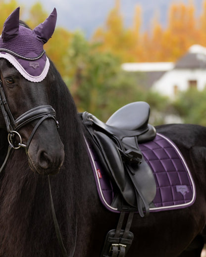 Juniper coloured LeMieux Loire Dressage Square on tree background 
