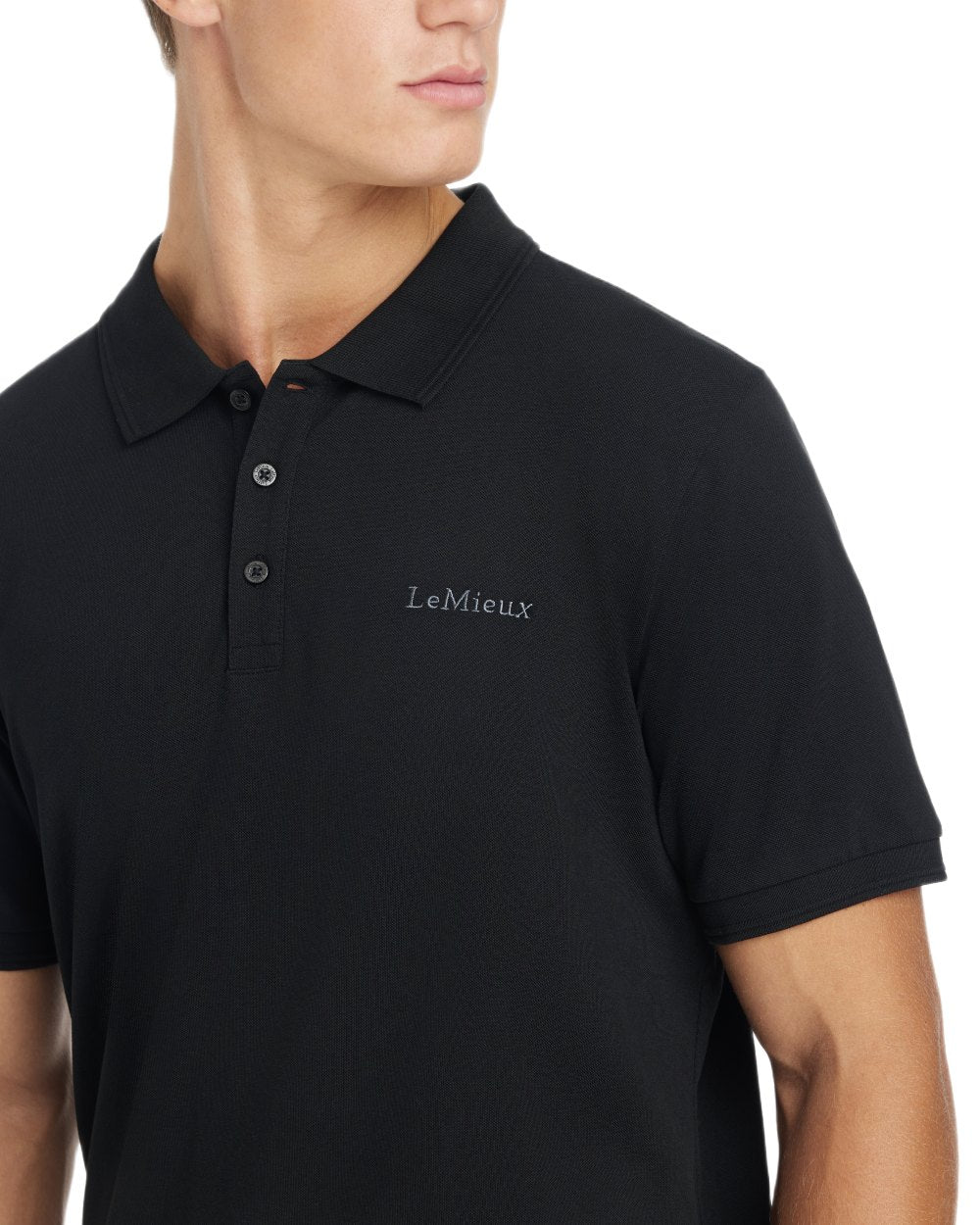Black coloured LeMieux Mens Classique Polo T-Shirt on white background 