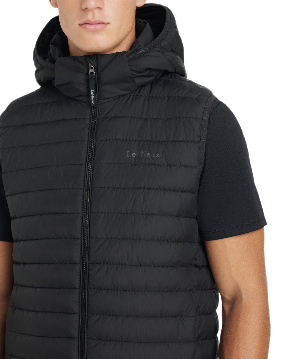 Black coloured LeMieux Mens Hooded Puffer Gilet on white background 