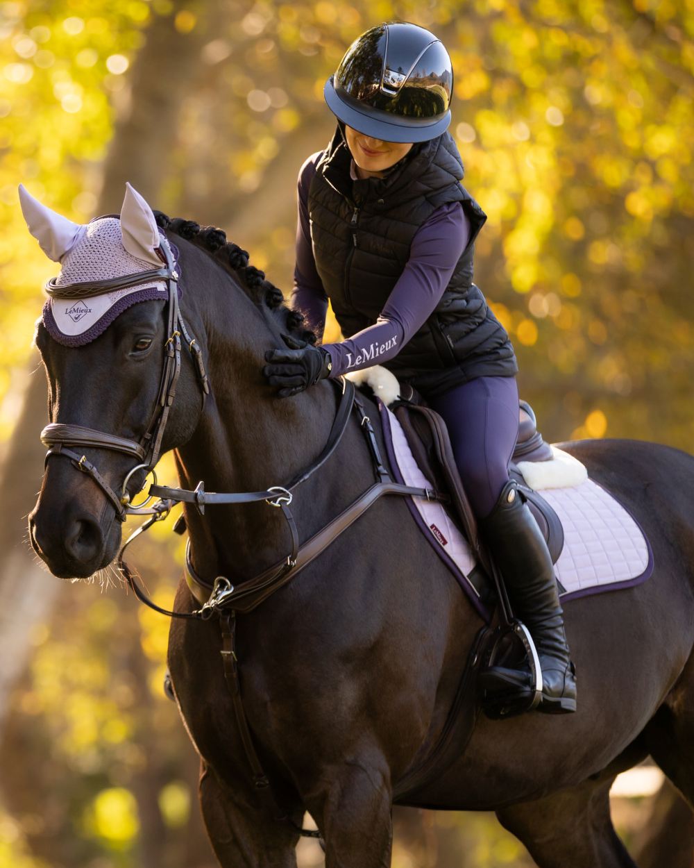 Lilac coloured LeMieux Merino Suede Close Contact Square on tree background 