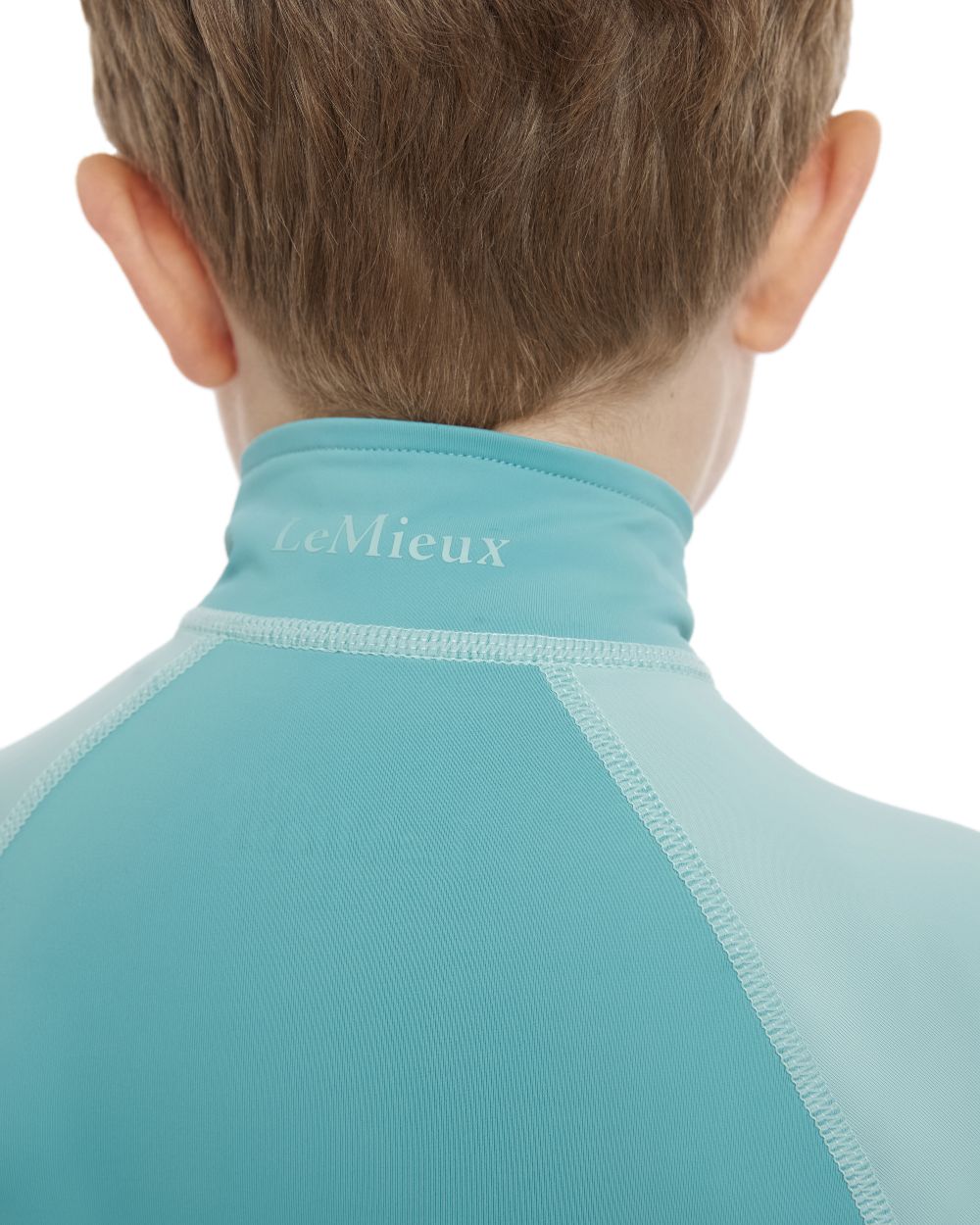 Lagoon coloured LeMieux Mini Base Layer on white background 