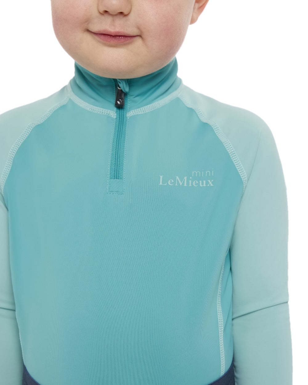 Lagoon coloured LeMieux Mini Base Layer on white background 