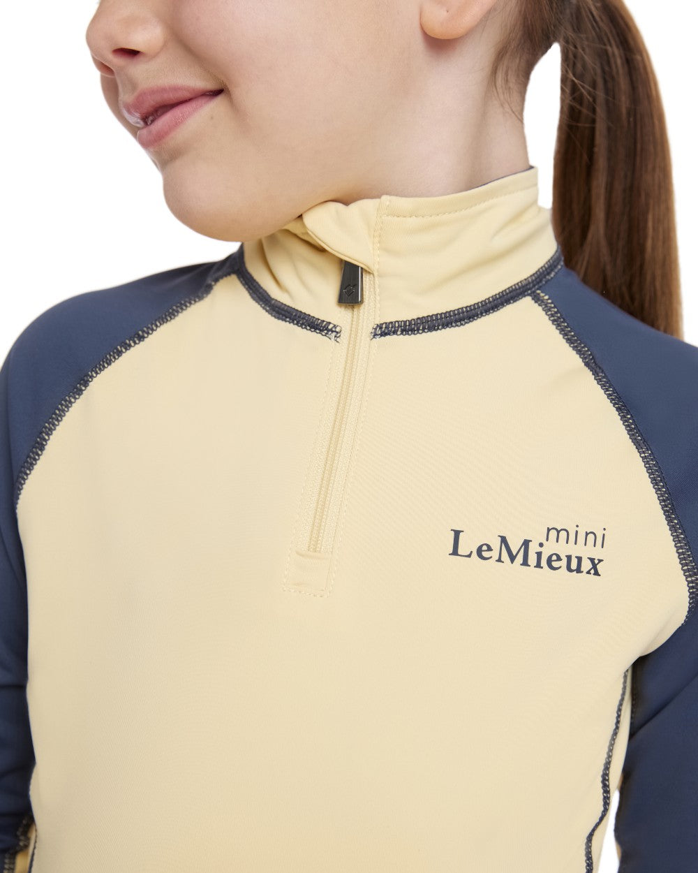 Mimosa coloured LeMieux Mini Base Layer on white background 